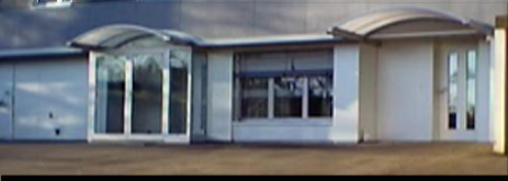 Portes d'entrée et parties fixes en aluminium éloxé naturel